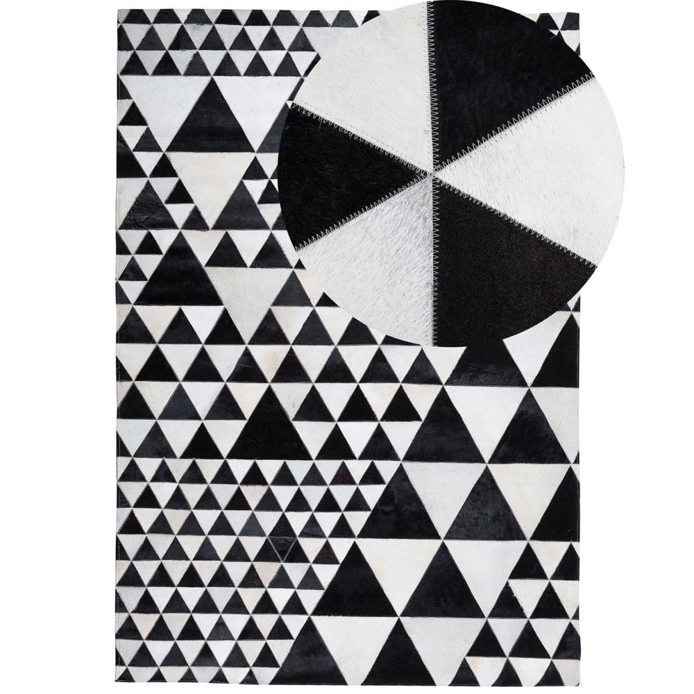 Image of Tappeto in pelle di colore Bianco e Nero Pelle 140 x 200 cm Artigianale stile Moderno